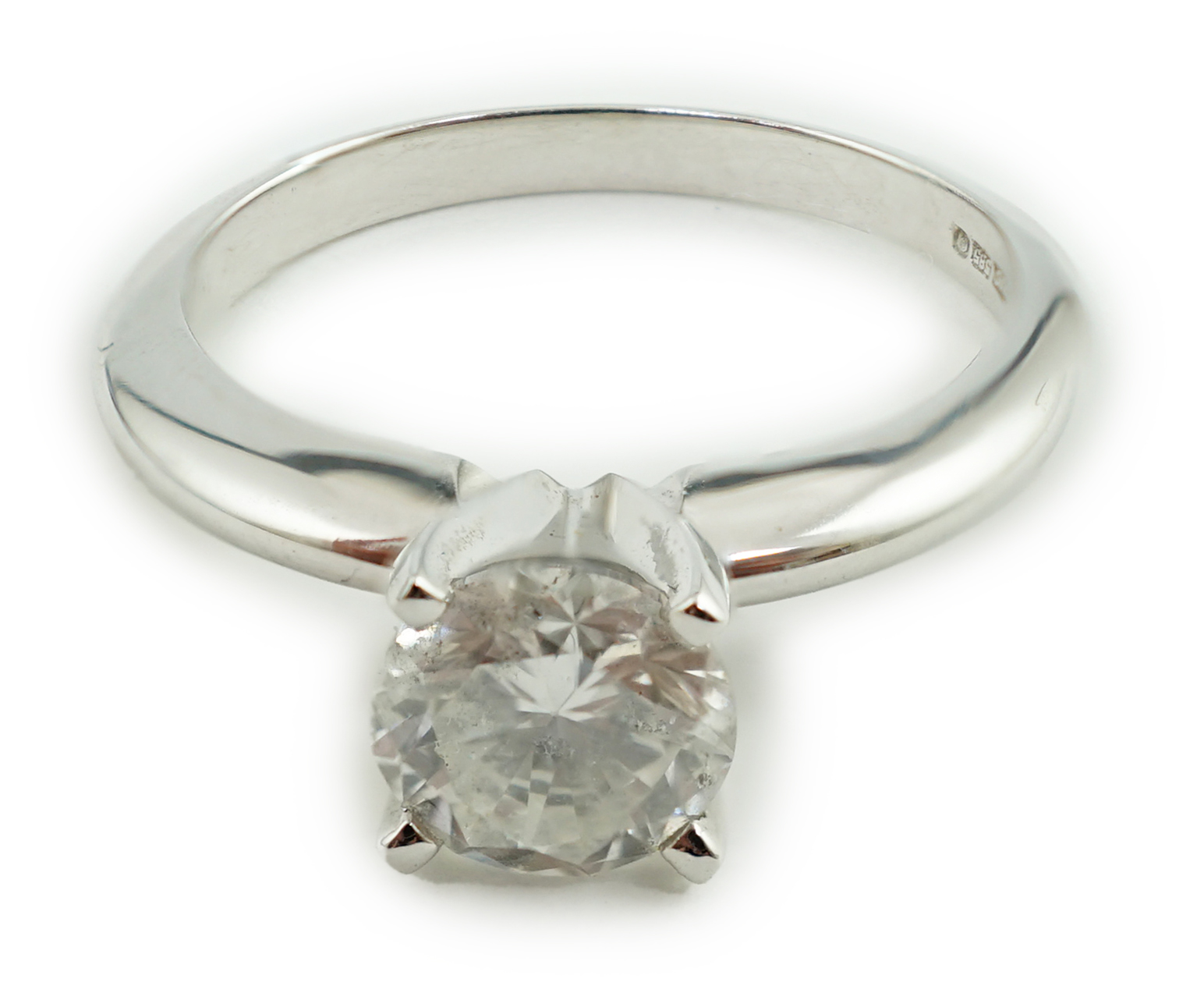 A modern 14k gold and solitaire diamond set ring